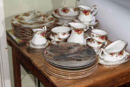 Royal Albert Old Country Roses, approximately fifty eight pieces, and collectors plates.