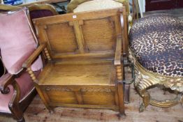 Oak monks bench with bobbin pillars, 71cm by 92cm by 48cm (closed).