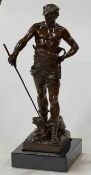 Good male bronze figure entitled BELLUAIRE and signed E. Marioton, 49cm high, with plinth base.