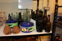 Glass bottles including beer, Ringtons pottery, carved clogs, etc.