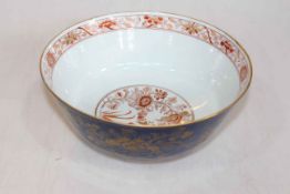 Chinese powder blue and gilt decorated bowl, 24.5cm diameter.