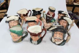 Collection of eleven Royal Doulton character jugs including Tam O'Shanter, Auld Mor and Falstaff.