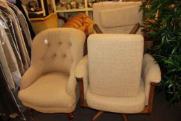 Ercol swivel armchair and footstool and button backed occasional chair.