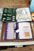 Two cased sets of EP teaspoons and lobster picks.