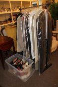 Collection of vintage ladies clothing and shoes, including clothes rail.