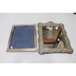 Large silver easel photograph frame, 30cm by 25cm, and ornate EP framed mirror (2).