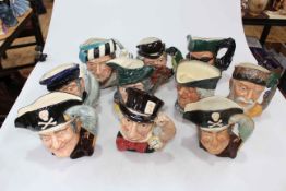 Collection of ten Royal Doulton character jugs including Dick Turpin and Robinson Crusoe.