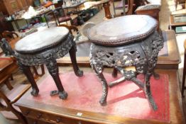 Two similar Chinese padouk and marble inset jardiniere stands (largest 49cm by 39cm diameter).