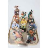 Collection of ten Royal Doulton figures including The Puppet Maker, The Clock Maker and The Jester.