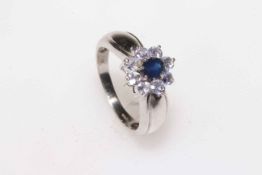 9 carat white gold, sapphire and white stone petal design ring, size O.
