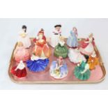 Collection of fourteen Royal Doulton small lady figures.