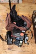 Bag with Voitlander camera, Tamron lense, Binatone, etc.