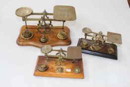Three sets of vintage brass postal scales.