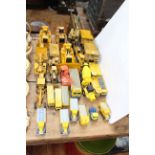 Collection of NZG, Conrad and other excavating commercial model vehicles including Blue Circle