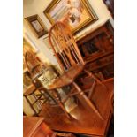 Old Charm oak court cupboard, draw leaf dining table and four panel back dining chairs (6).