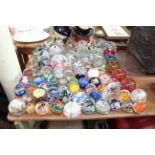 Large collection of glass paperweights.