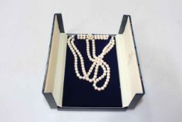 Pearl triple row cluster necklace with 9 carat gold clasp, 36cm length.