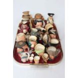 Collection of twenty two Royal Doulton small character jugs including Pickwick whisky ceramics.