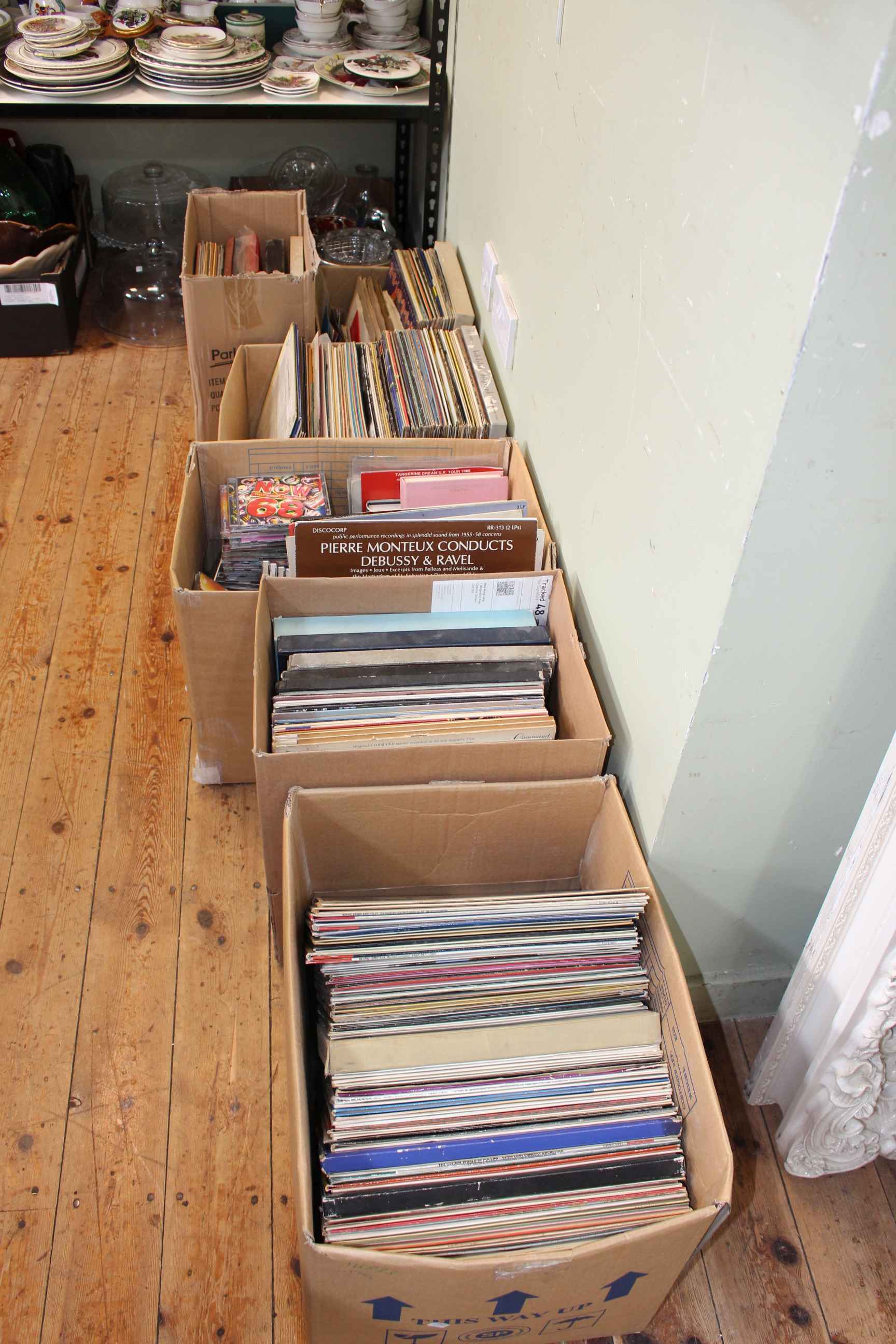 Six boxes of LP and 45rpm vinyls, CD's, books, etc.