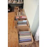 Six boxes of LP and 45rpm vinyls, CD's, books, etc.