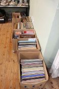 Six boxes of LP and 45rpm vinyls, CD's, books, etc.