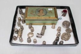 Collection of silver thimbles, scent bottle and boxes, 28 pieces, and QEII souvenir tin.