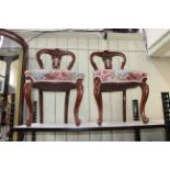 Pair Victorian mahogany parlour chairs with floral needlework seats.