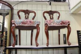 Pair Victorian mahogany parlour chairs with floral needlework seats.