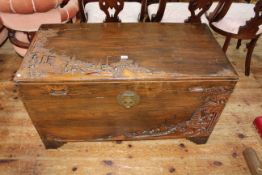 Oriental carved camphorwood trunk, 59.5cm by 105cm by 51cm.