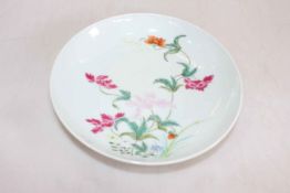 Chinese famille rose saucer dish with flower decoration, six character mark, 20.5cm diameter.