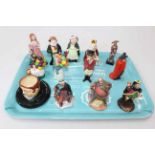 Collection of twelve small Royal Doulton figures and match holder.