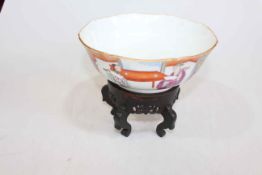 Chinese porcelain bowl, painted with figures in settings, seal mark, 22cm diameter, with stand.