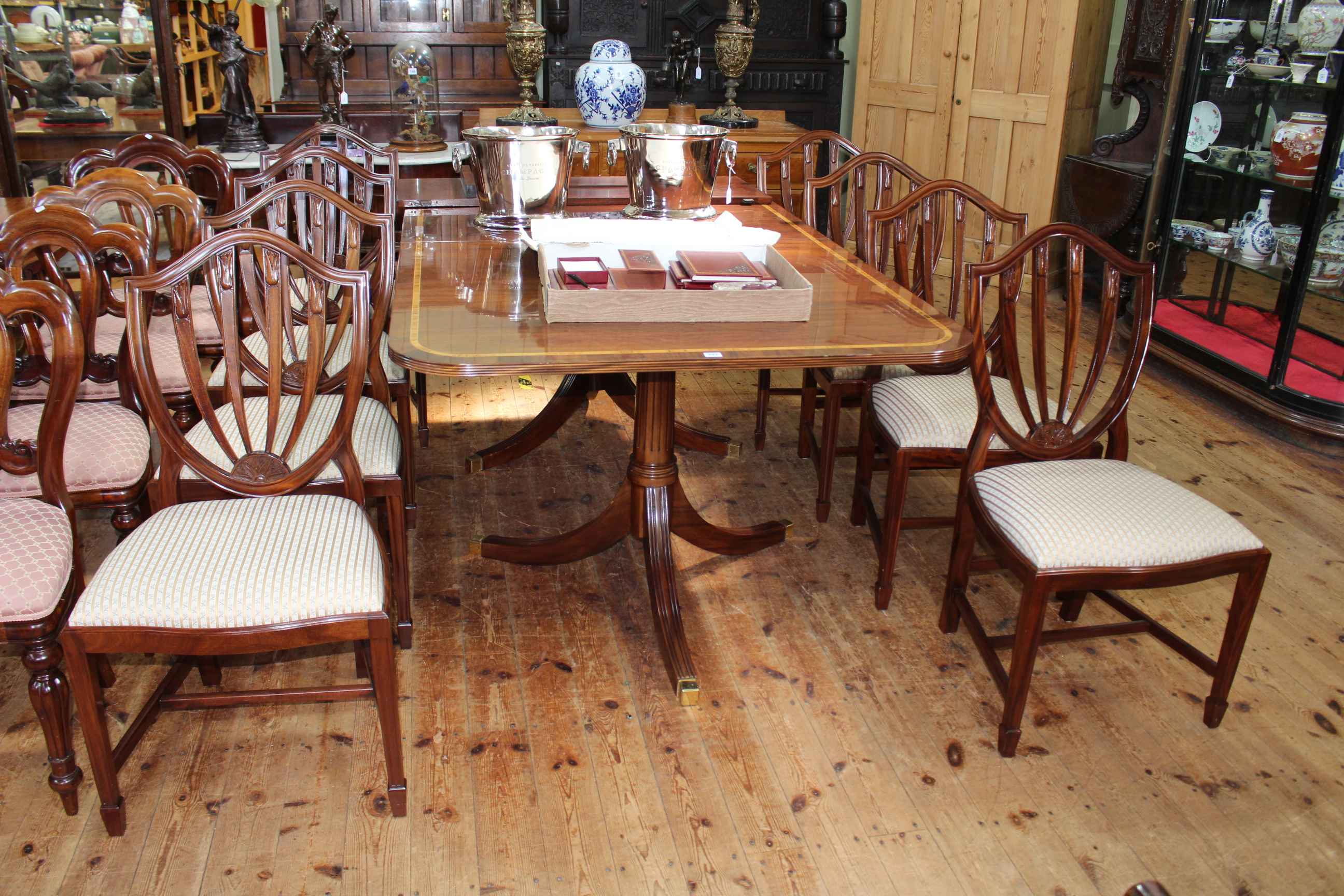 Mahogany and satinwood banded twin pedestal extending dining table and leaf 76cm by 201cm by 116cm