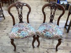 Pair Victorian mahogany parlour chairs with floral needlework seats.