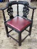 Victorian carved oak corner elbow chair.