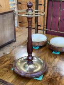 Brass and hardwood revolving stick stand, 61cm.