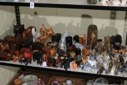 Large collection of ornamental elephants.