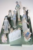 Collection of seven Lladro figures and collectors plaque, together with four other figures.