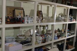 Full shelf of glass, china, pewter, copper and brass graduated pans, table lamps, seashells, etc.