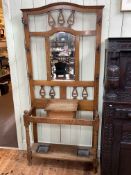 Arts & Crafts oak mirror backed hallstand, 201cm by 90cm by 30.5cm.