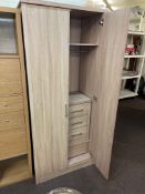 Contemporary two door wardrobe and matching three drawer pedestal.