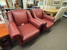 Pair red leather armchairs.