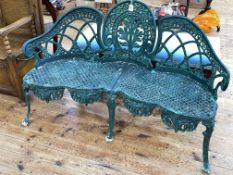 Green cast metal garden bench with shaped front seat, 138cm.