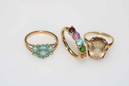 Three gem set 9 carat gold rings.