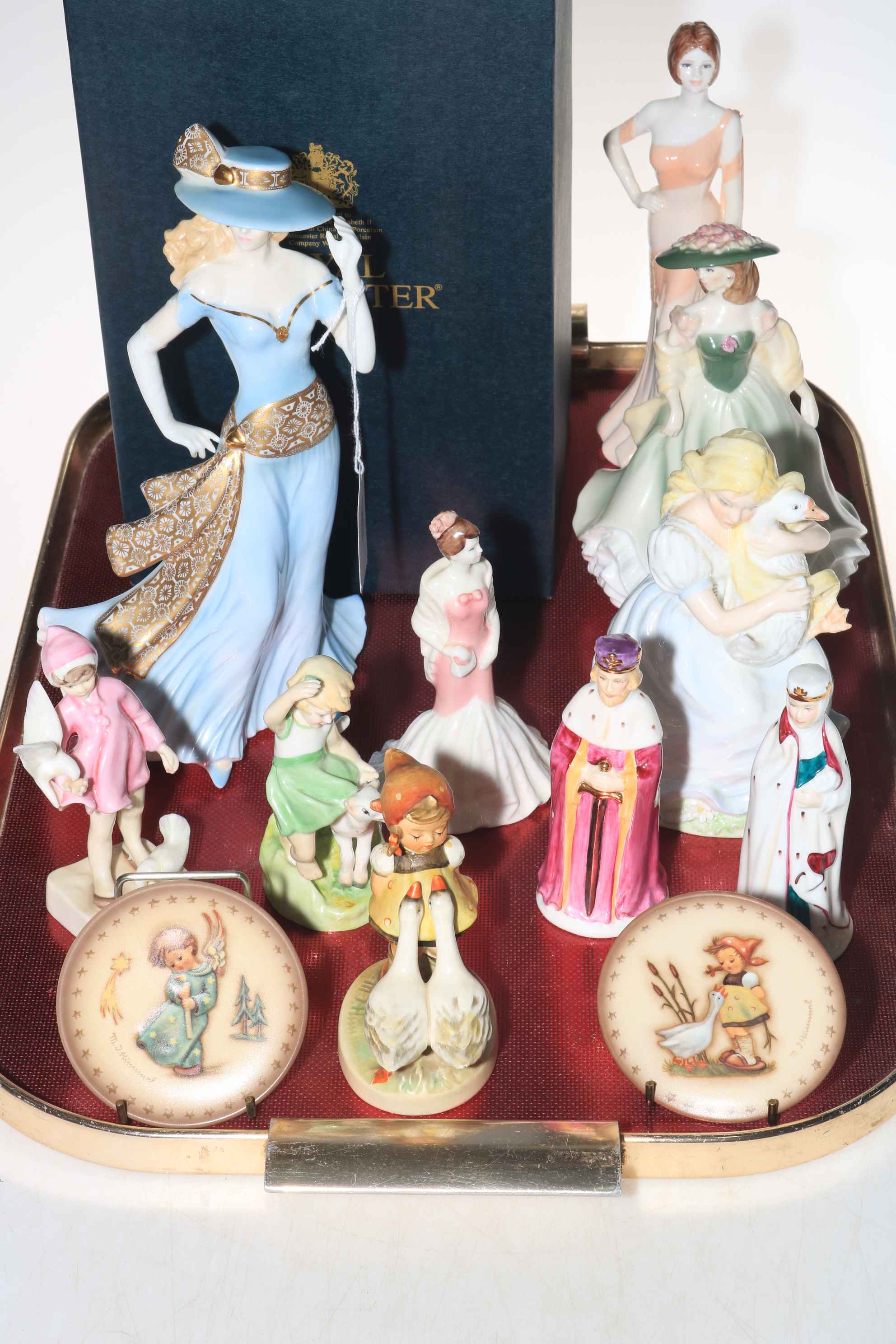 Four Royal Worcester figures including Peace and Springtime, Coalport Goose Girl and two others,