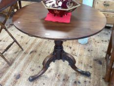 19th Century circular mahogany snap top supper table on pedestal tripod base, 71cm by 91.