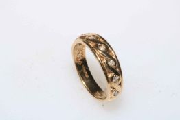 9 carat gold seven stone diamond eternity ring, size M.