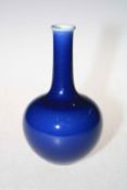 Chinese blue glazed bottle neck vase with Qianlong mark to base, 21cm high.