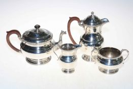 Adie Bros Ltd silver four piece tea set, having Celtic influence border and spout decoration,
