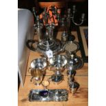 Silver plated wares including pair five light candelabra, tea set, cruets, etc.